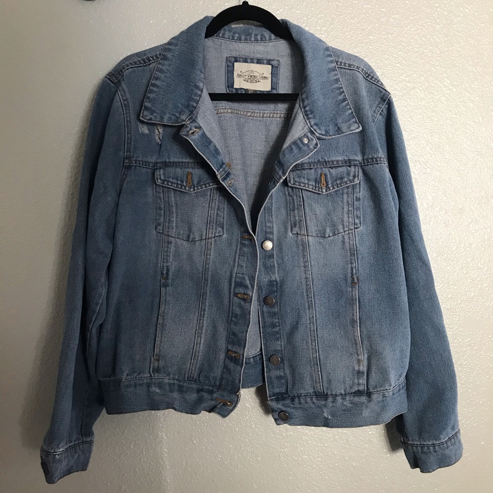Distressed denim jacket
